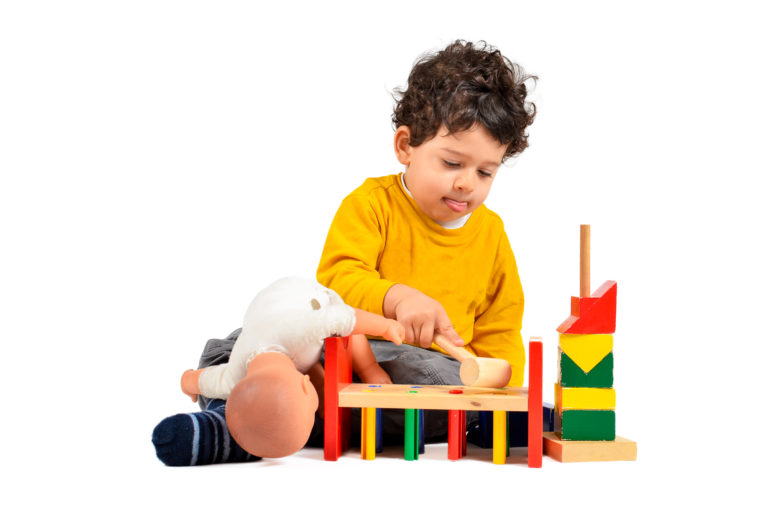 Boy and didactic toys