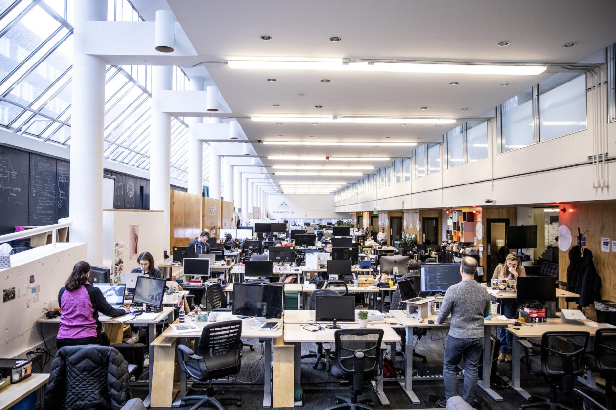 CoMotion Labs' space with many people working at desks
