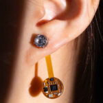 photo of tech enabled earring on earlobe