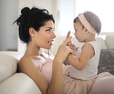 mom and baby interacting