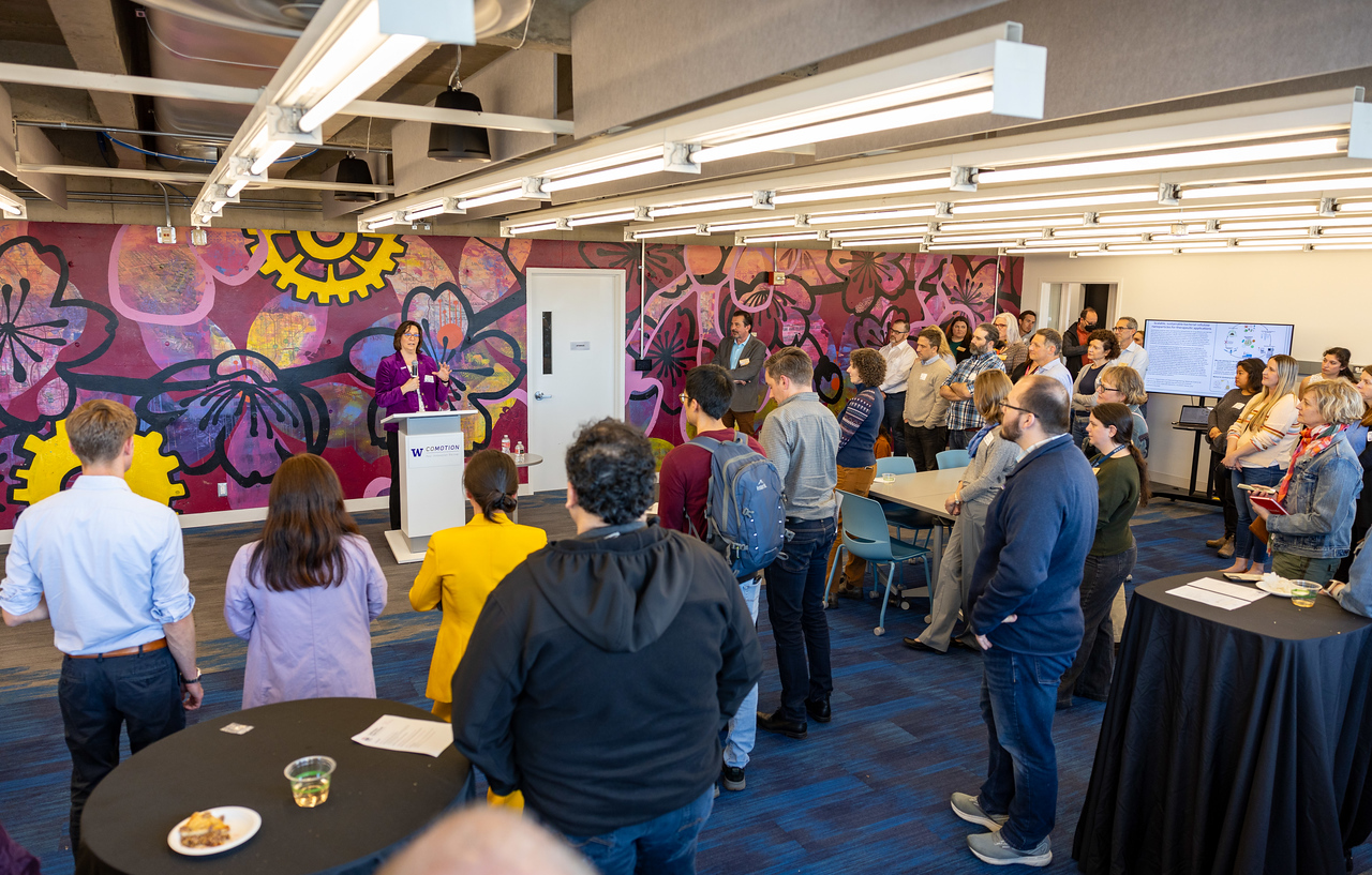 UW Provost Tricia Serrio addresses the room at the CoMotion open house on May 1.
