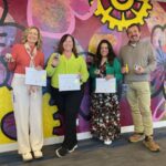 CoMotion staff honorees pose with certificates at the CoMotion Innovates celebration.