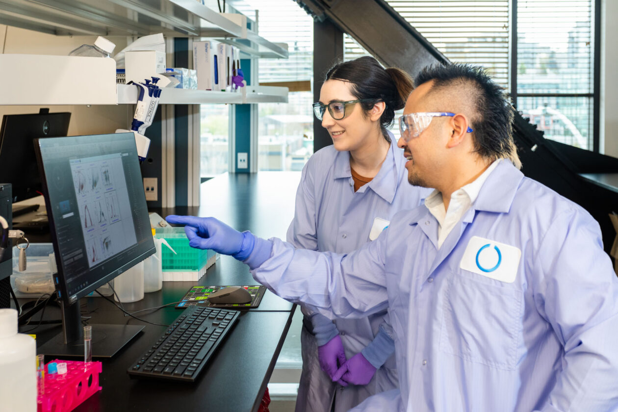 employees of Outpace Bio in the lab