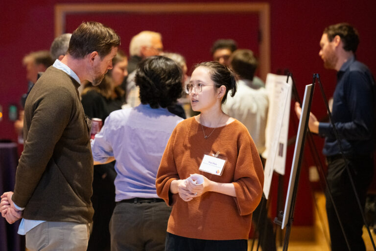 Researcher Yizi Mao presents her poster at the 2024 UW School of Medicine Inventor of the Year reception and CoMotion Innovator Showcase.