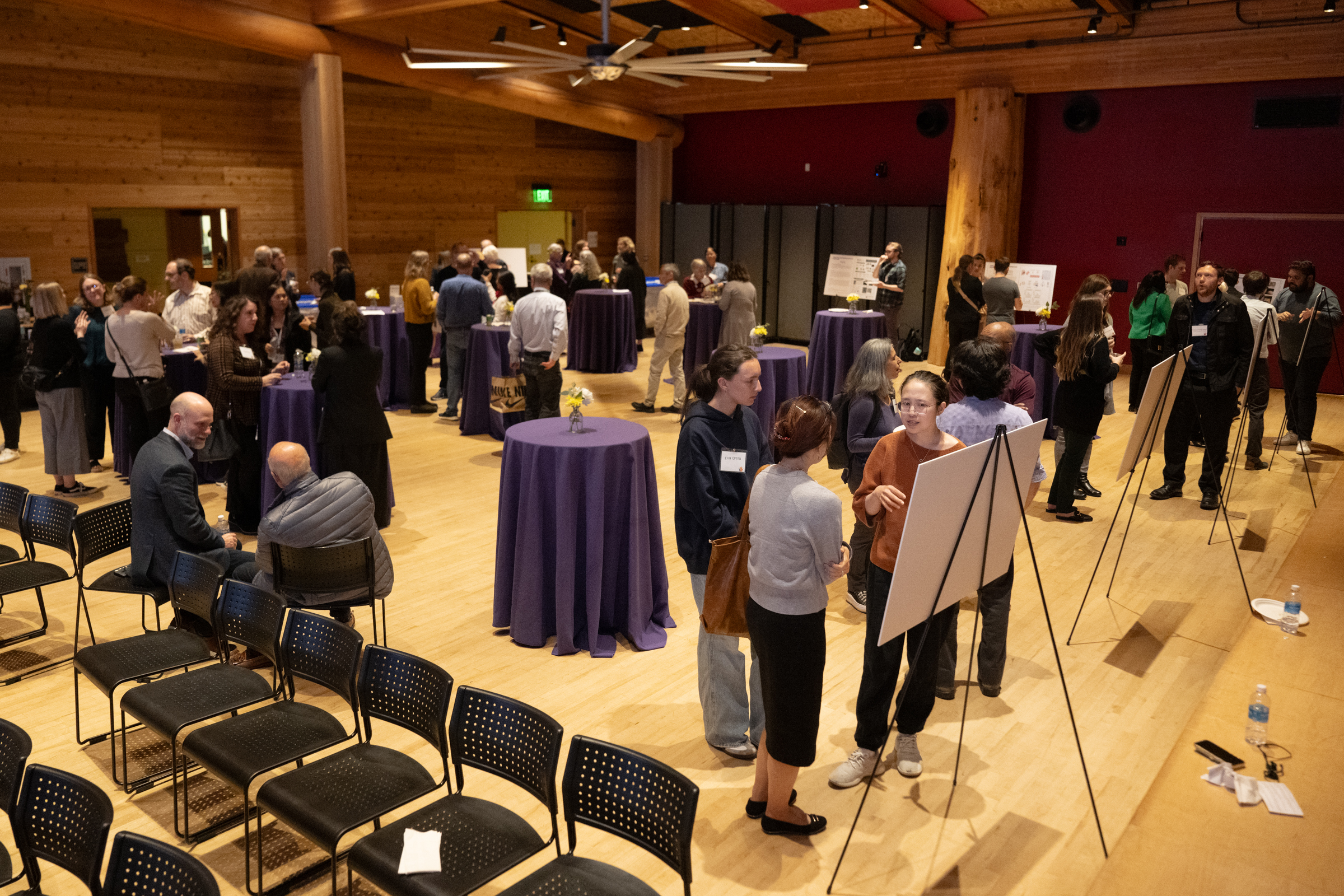 Attendees socializing at the 2024 UW School of Medicine Inventor of the Year reception and CoMotion Innovator Showcase