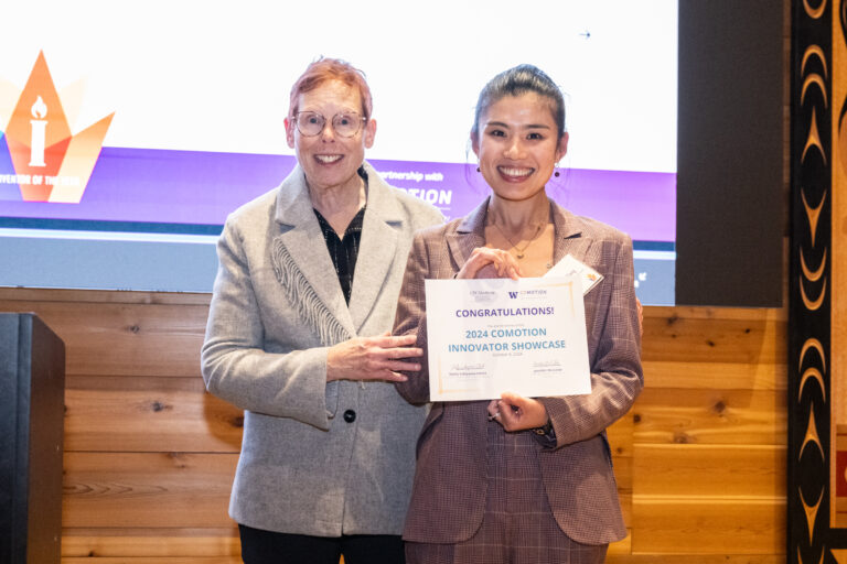 2024 UW School of Medicine Inventor of the Year honoree Nora Disis poses with researcher Cheri Fang, whose project won the CoMotion Innovator Showcase prize for best pitch.