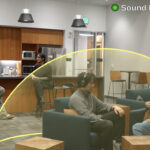 people on couch talking with "sound bubble" technology illustrated