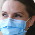 woman wearing surgical mask