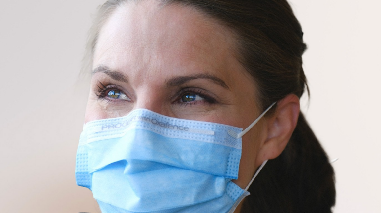 woman wearing surgical mask