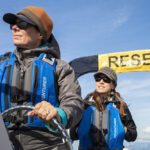 2 researchers on a boat