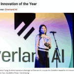 Amanda Tsang, business operations manager at Overland AI, accepts the GeekWire Award for AI Innovation of the Year.