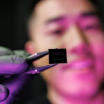 Bingzhao Li with chip