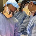 neurosurgeons Andrew Ko (left) and Ben Grannan