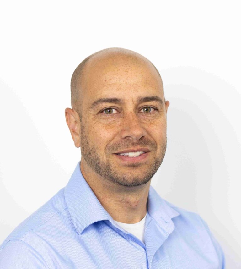 Headshot of Damian Madan