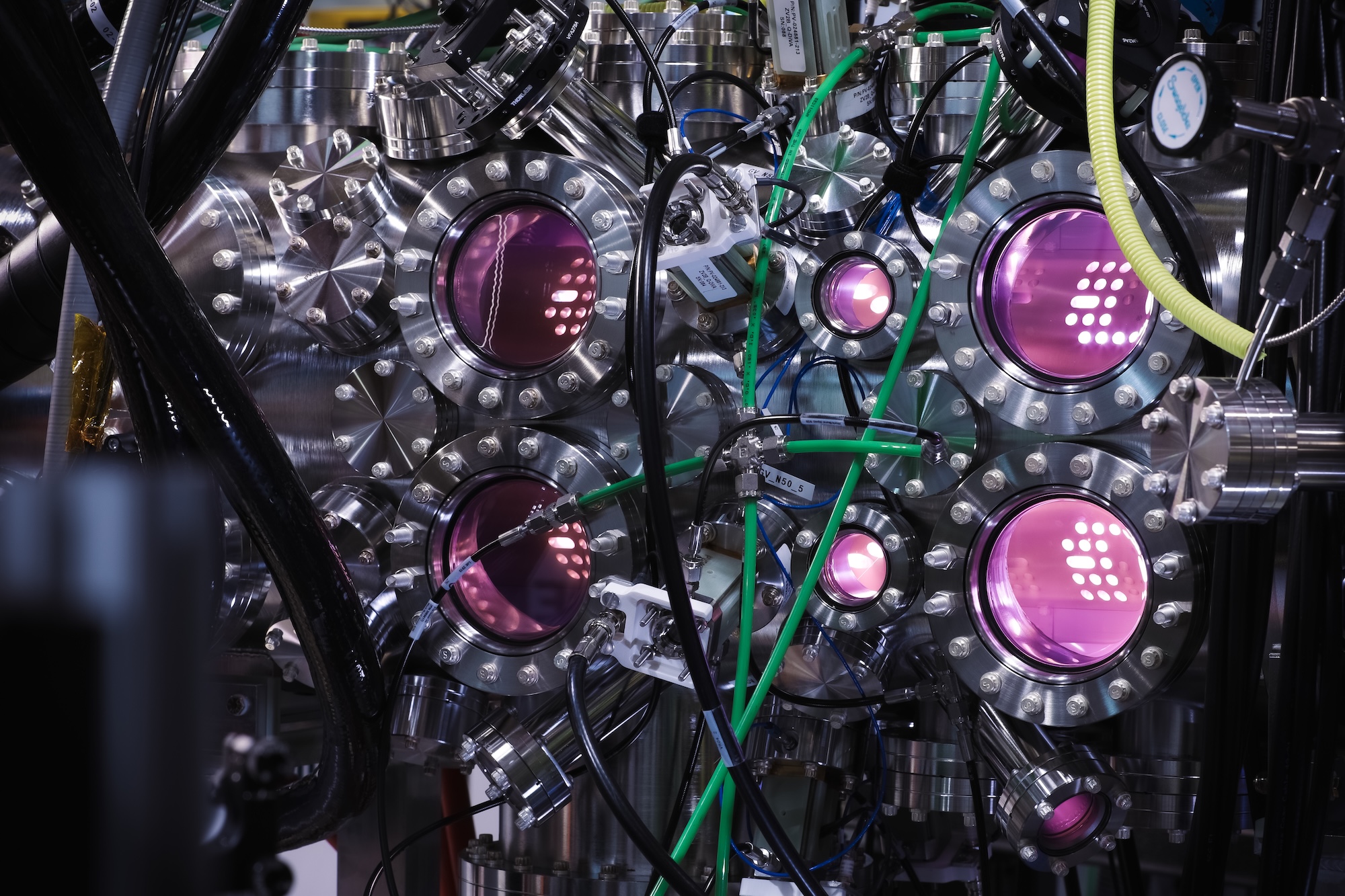 Zap Energy’s fusion device creates a purplish glow from its hydrogen plasma