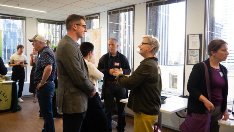 Table presentation at the Climate Tech Incubator Demo Day.