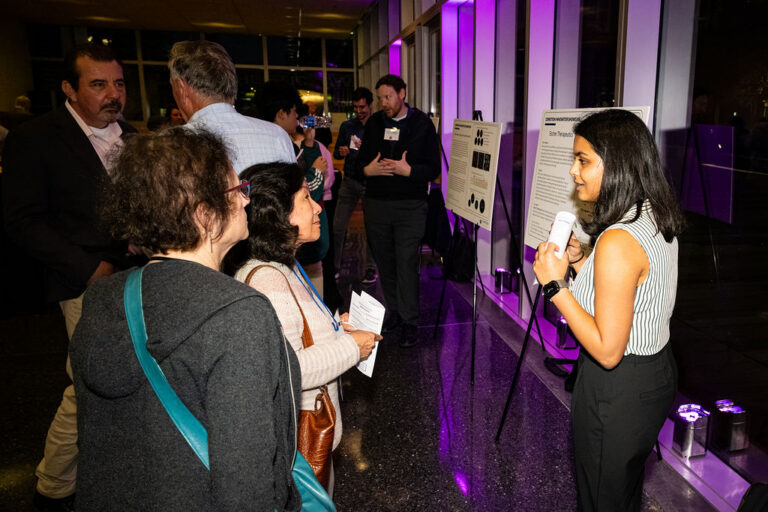 UW Chemistry graduate student and CoMotion Innovator Showcase winner Nidhi Mehta with attendees at the UW School of Medicine 2026 Inventor of the Year event